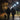 Elderly couple holds hands while using a hands-free dog leash on a quiet, well-lit evening walk for safety and comfort.